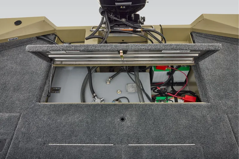 Slide: The Image of Manufacturer Provided Image: 2026 Tracker Pro Team 195 boat battery compartment with wiring and storage. - 59