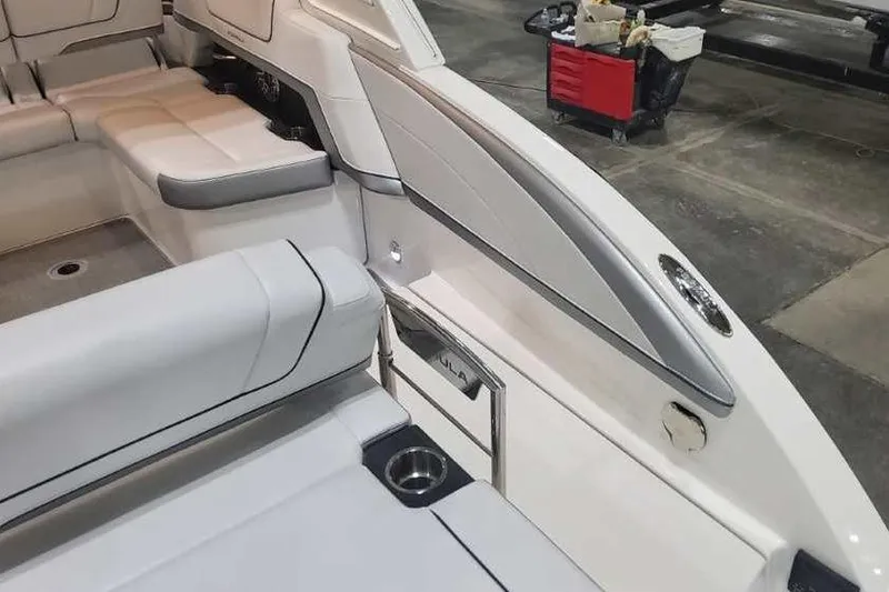 Slide: The Image of 2024 Formula 330 Crossover Bowrider I/O interior with sleek seating and modern design. - 10