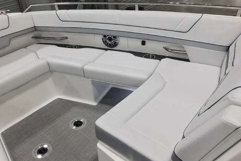 Slide: The Image of 2024 Formula 330 Crossover Bowrider I/O interior with sleek seating and modern design. - 30