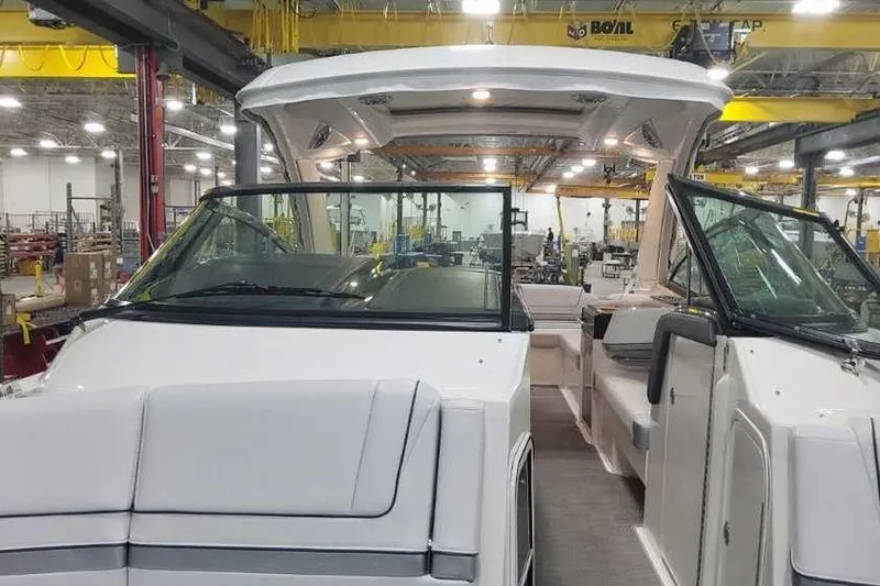 Slide: The Image of 2024 Formula 330 Crossover Bowrider I/O in a manufacturing facility. - 37