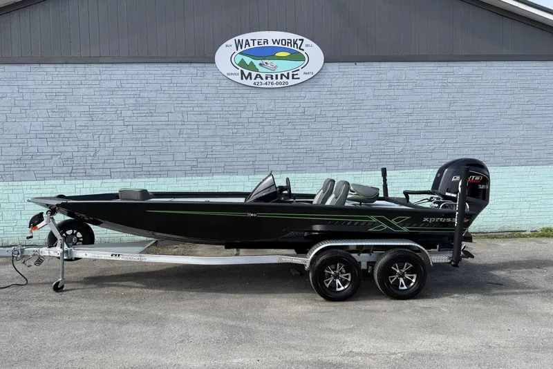 The Image of 2026 Xpress H20 Bass boat on trailer at Water Workz Marine dealership. - 1