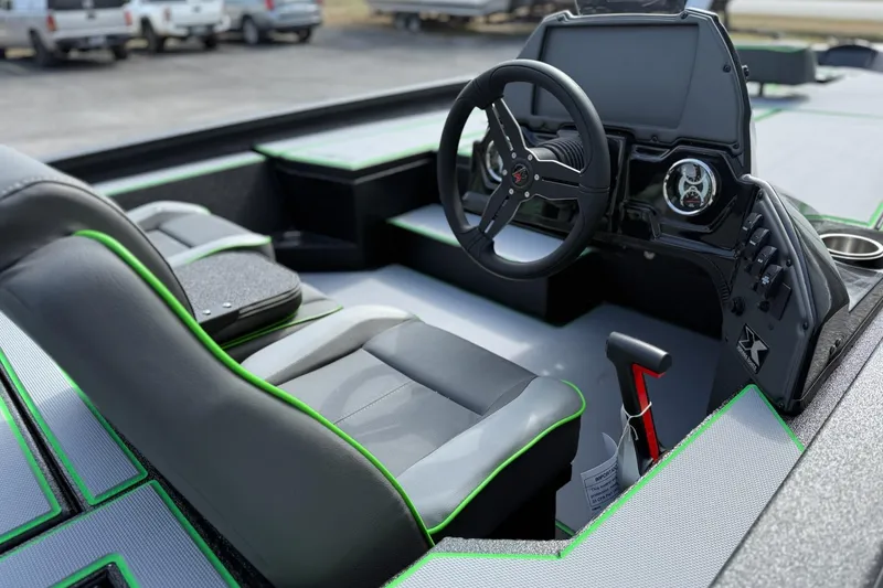 Slide: The Image of 2026 Xpress H20 Bass boat interior with modern steering and seating design. - 7