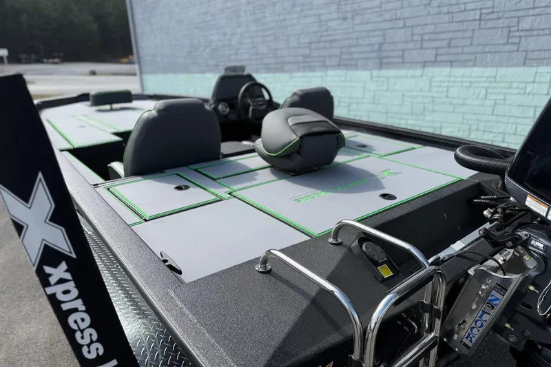 Slide: The Image of 2026 Xpress H20 Bass boat interior with seating and control panel. - 9