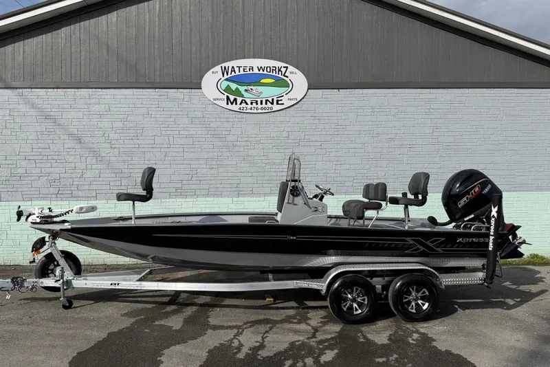 The Image of 2026 Xpress H22B Bay boat on trailer, parked outside Water Workz Marine. - 1
