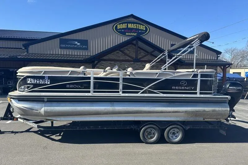 The Image of 2015 Regency 220 DL3 pontoon boat on trailer at Boat Masters Marine. - 1