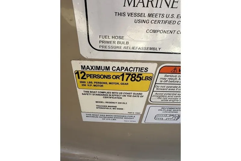 Slide: The Image of Capacity label for 2015 Regency 220 DL3 boat, max 12 persons or 1785 lbs. - 3
