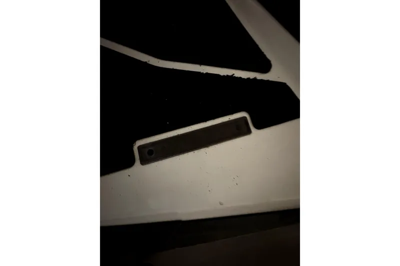 Slide: The Image of Close-up of a 2015 Sea-Doo GTS 130 footrest area with black grip pads. - 10