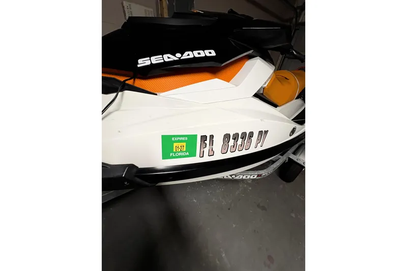 Slide: The Image of 2015 Sea-Doo GTS 130 jet ski with Florida registration sticker. - 5