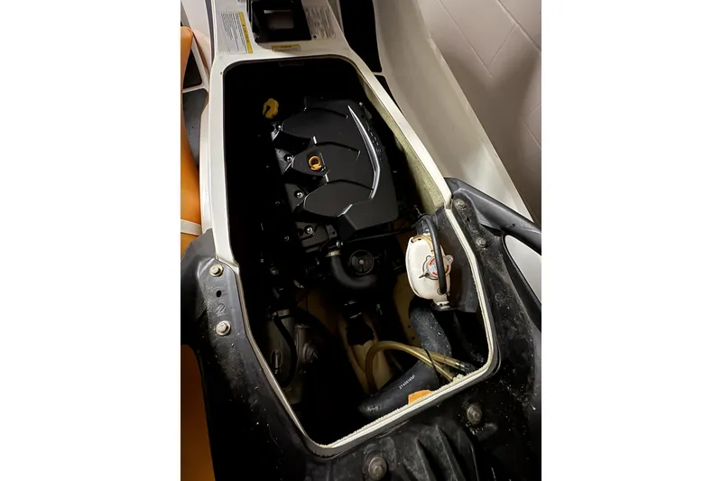 Slide: The Image of 2015 Sea-Doo GTS 130 engine compartment, showcasing internal components and design. - 9