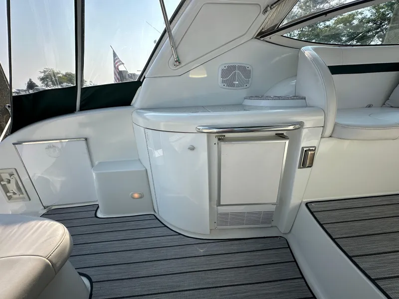 Slide: The Image of 2004 Formula 34 PC yacht interior with sleek white seating and modern design. - 6