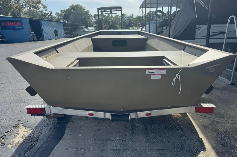Slide: The Image of 2026 G3 Gator Tough 1860 VBW boat on trailer in outdoor setting. - 2