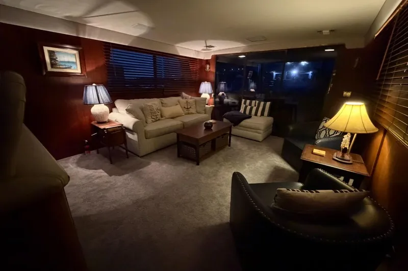 Slide: The Image of Aerial view of 1987 Hatteras 54 Motor Yacht cruising on open water. - 10