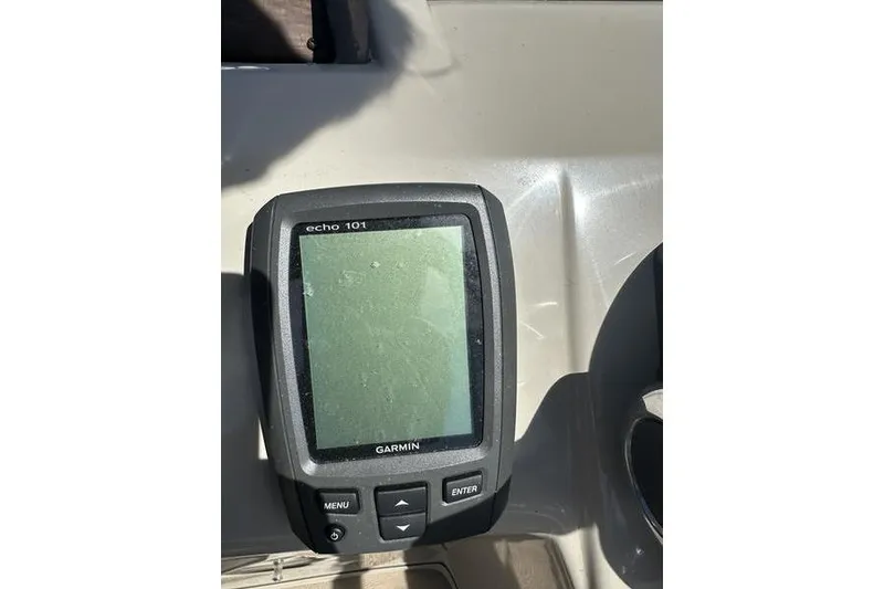 Slide: The Image of Garmin Echo 101 fishfinder on 2015 Bennington 22 SLX boat dashboard. - 16