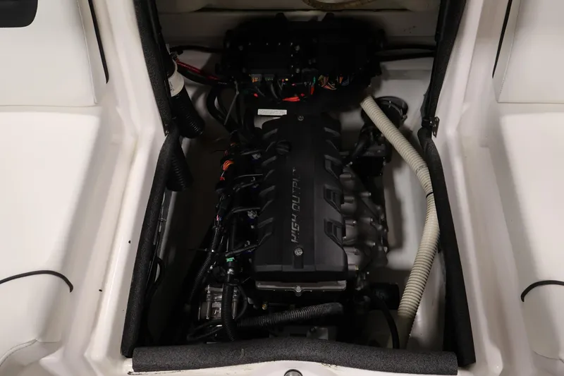 Slide: The Image of Engine compartment of a 2016 Yamaha Boats SX190, showcasing the high-output engine. - 30