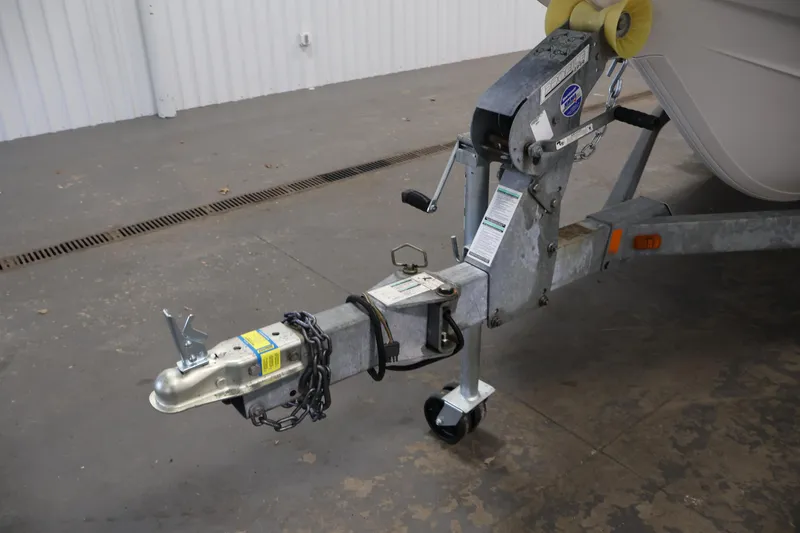 Slide: The Image of Trailer hitch of a 2016 Yamaha Boats SX190 in a garage setting. - 35