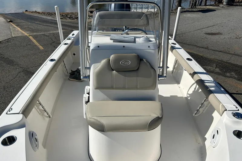 Slide: The Image of 2021 Key West 188 Bay Reef boat interior with seating and console. - 12