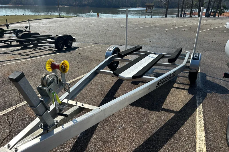 Slide: The Image of Empty boat trailer in parking lot near lake, designed for 2021 Key West 188 Bay Reef. - 16