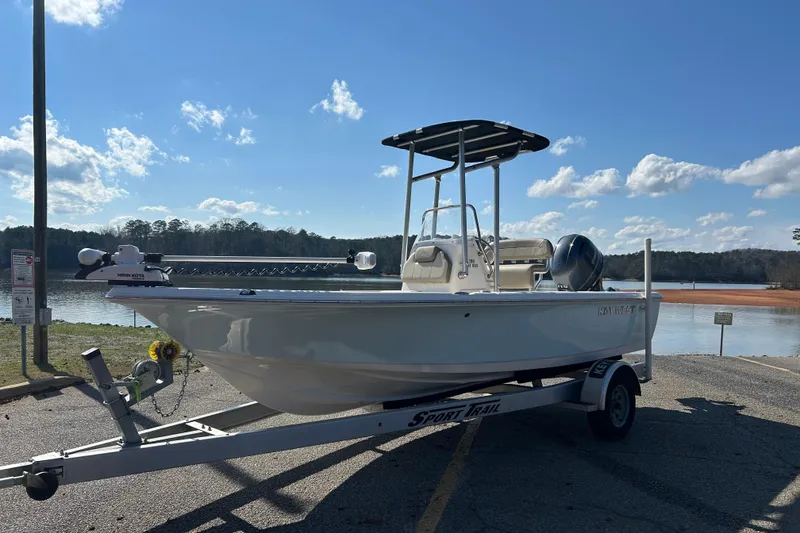 Slide: The Image of 2021 Key West 188 Bay Reef boat with Yamaha engine, side view. - 6