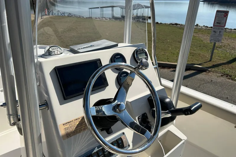 Slide: The Image of 2021 Key West 188 Bay Reef boat console with steering wheel and gauges. - 8