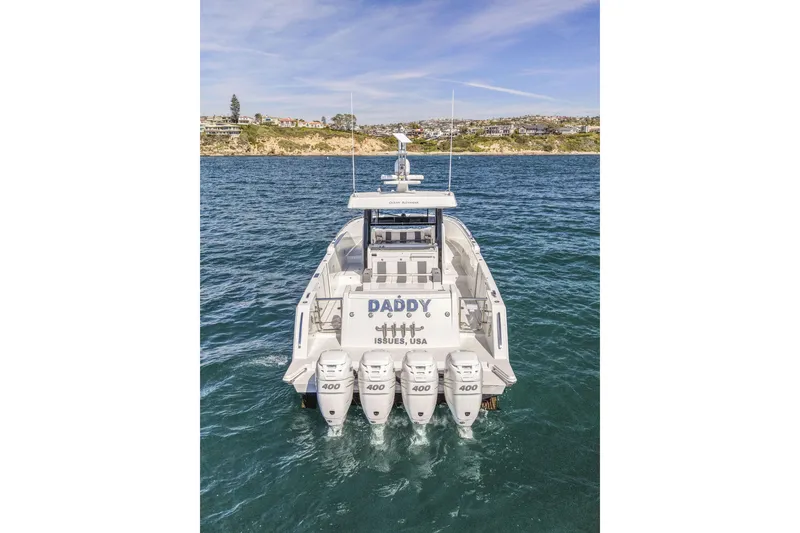 Slide: The Image of 2021 Ocean Alexander 45 Divergence Sport boat with four engines on open water. - 7