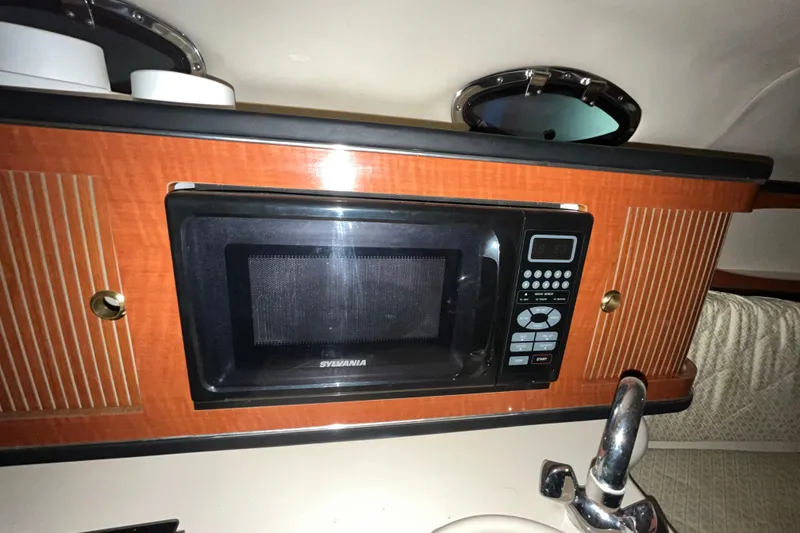 Slide: The Image of Microwave in 2004 Sea Ray Sundancer 260 boat interior kitchen area. - 16