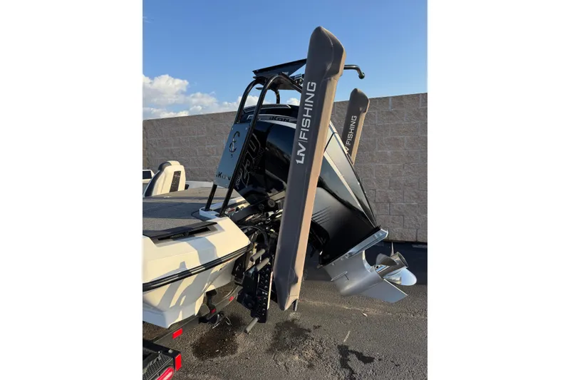 Slide: The Image of 2024 Ikon Boats 21 with LIV Fishing equipment, rear view showing motor and propeller. - 10