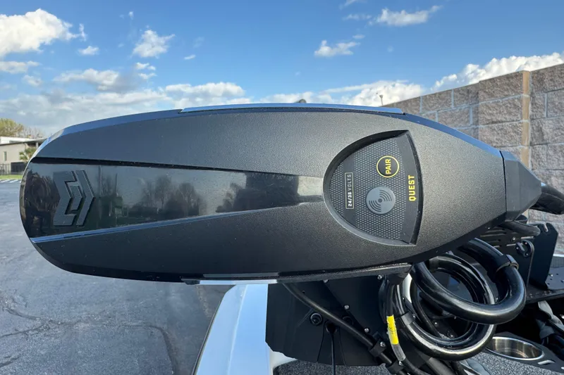 Slide: The Image of Close-up of Ikon Boats 21 motor, 2024 model, featuring control panel and cables. - 6