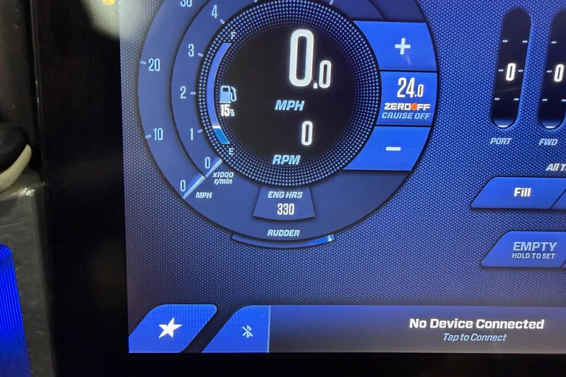 Slide: The Image of Dashboard display of 2025 MasterCraft X24 boat showing speed, fuel, and engine hours. - 24