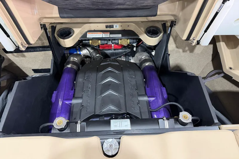 Slide: The Image of 2025 MasterCraft X24 engine compartment with a powerful supercharged engine. - 25