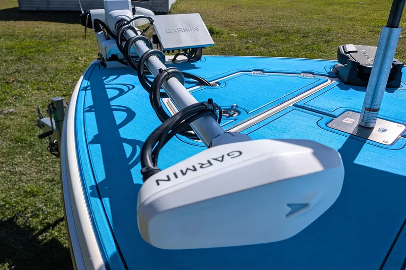 Slide: The Image of 2023 ShearWater X22 Hybrid boat with Garmin equipment on blue deck. - 18