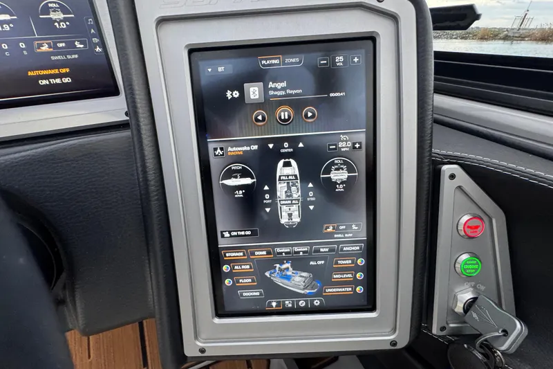 Slide: The Image of Touchscreen control panel in 2023 Supra SE 550 boat, displaying navigation and audio settings. - 17