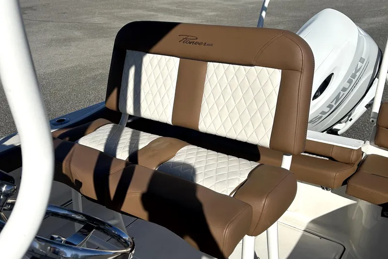 Slide: The Image of 2023 Pioneer 222 Islander boat seat with brown and white quilted upholstery. - 20