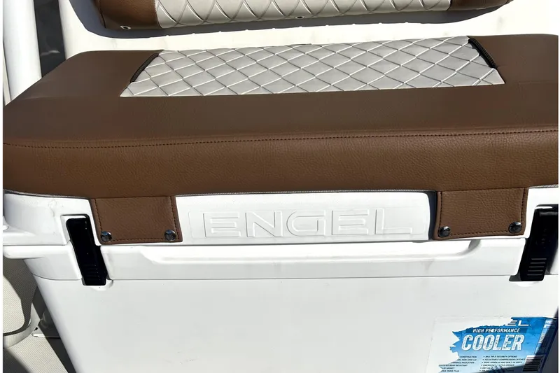 Slide: The Image of Engel cooler with cushioned seat on 2023 Pioneer 222 Islander boat. - 9