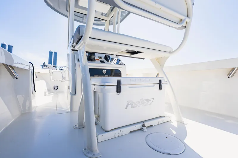 Slide: The Image of Interior view of a 2023 Parker 2400 boat, featuring a white Engel cooler. - 14