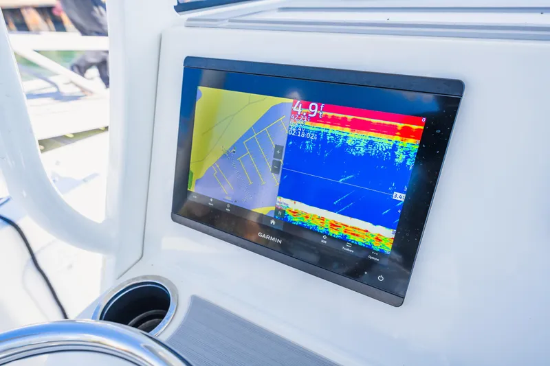 Slide: The Image of Garmin marine display on 2023 Parker 2400 boat, showing navigation and sonar data. - 20