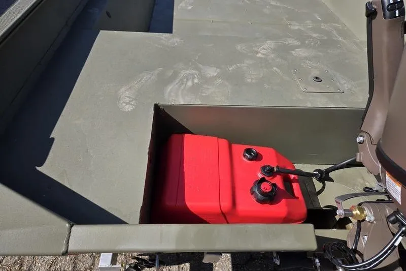 Slide: The Image of 2025 Tracker Grizzly 2072 Utility boat with red fuel tank in storage compartment. - 3