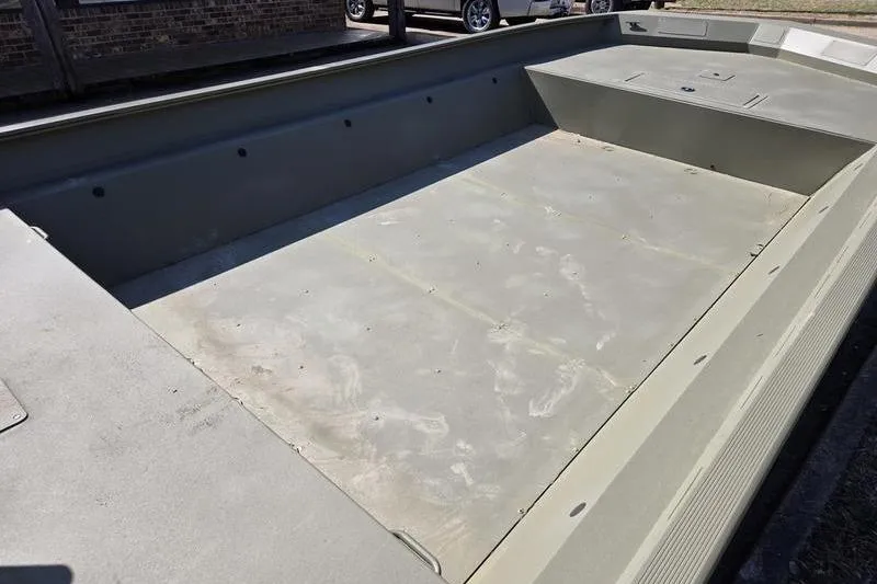 Slide: The Image of 2025 Tracker Grizzly 2072 Utility boat interior, spacious and durable design. - 6