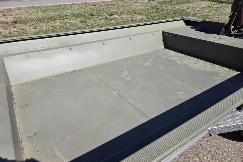 Slide: The Image of 2025 Tracker Grizzly 2072 Utility boat interior, showcasing spacious, durable design. - 8