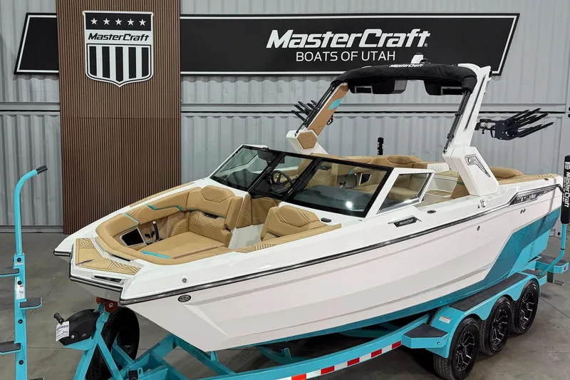 The Image of 2025 MasterCraft XStar 23 boat displayed at MasterCraft Boats of Utah showroom. - 1