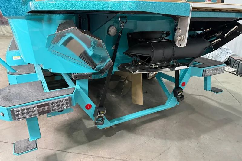 Slide: The Image of 2025 MasterCraft XStar 23 boat rear view, showcasing advanced propulsion and design features. - 15