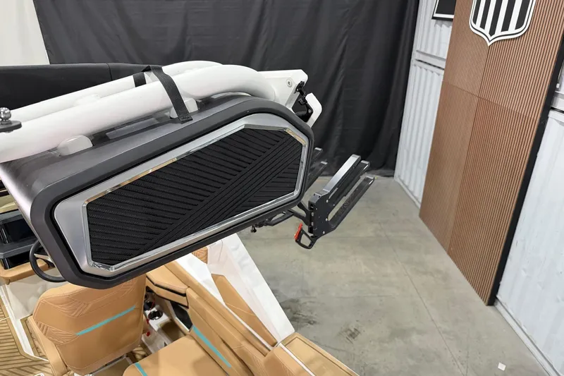 Slide: The Image of 2025 MasterCraft XStar 23 boat interior with premium seating and advanced audio system. - 16