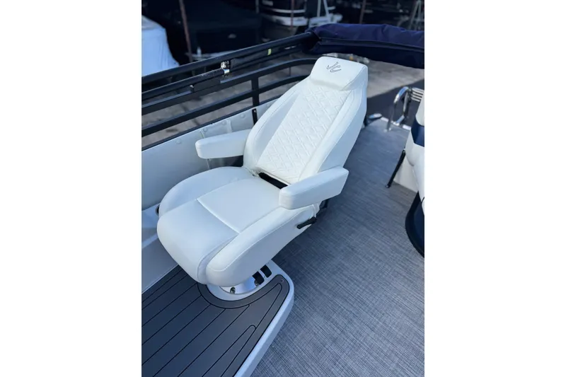 Slide: The Image of Luxurious white captain's chair on 2026 JC 23 Neptoon TT Sport boat. - 11