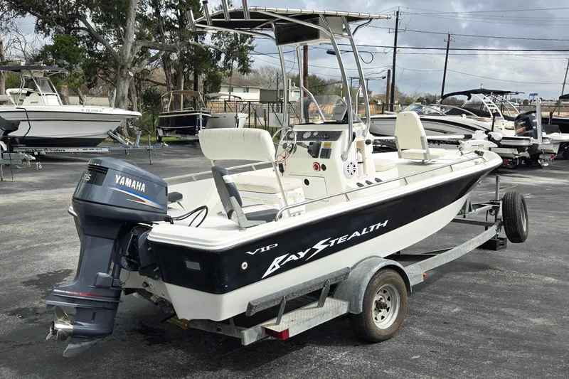Slide: The Image of 2001 VIP 1880 Bay Stealth boat on trailer with Yamaha outboard motor. - 3