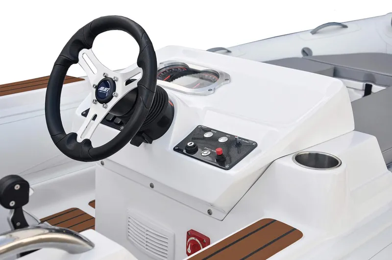 Slide: The Image of Manufacturer Provided Image: Steering console of the 2026 AB Inflatables ABJET 465XP. - 6