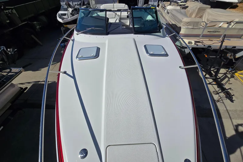 Slide: The Image of 2017 Formula 310 Sun Sport boat, top view, docked among other vessels. - 102