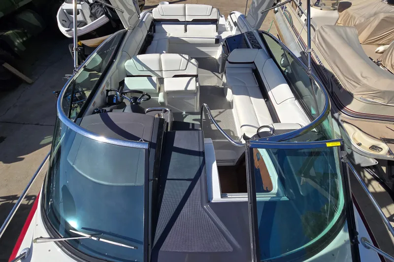 Slide: The Image of 2017 Formula 310 Sun Sport boat interior with white seating and sleek design. - 103