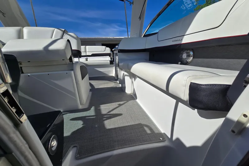 Slide: The Image of Interior of a 2017 Formula 310 Sun Sport boat with white seating and sleek design. - 104