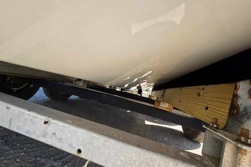 Slide: The Image of 2017 Formula 310 Sun Sport boat hull on trailer, underside view. - 109