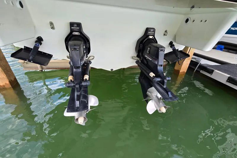 Slide: The Image of 2017 Formula 310 Sun Sport boat with dual Mercury outboard motors in water. - 14