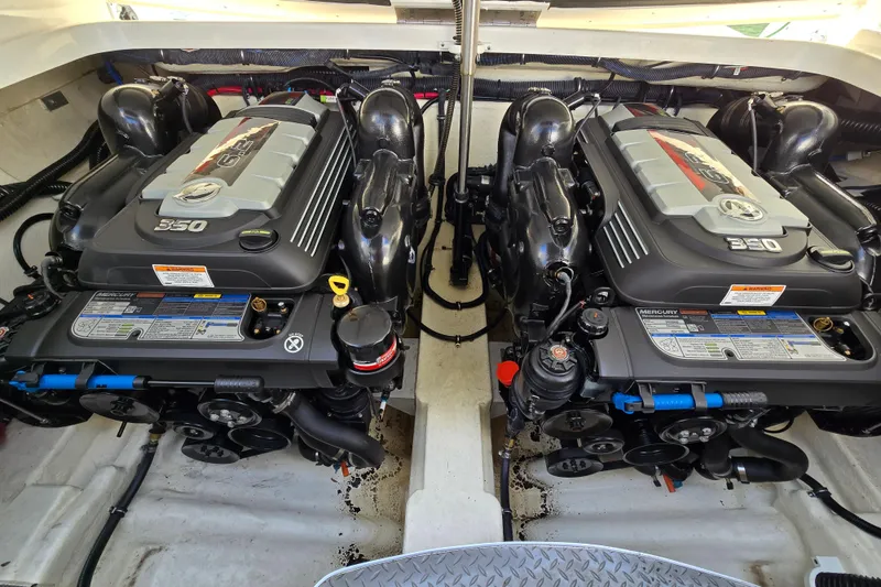Slide: The Image of Twin Mercury 350 engines in a 2017 Formula 310 Sun Sport boat. - 15